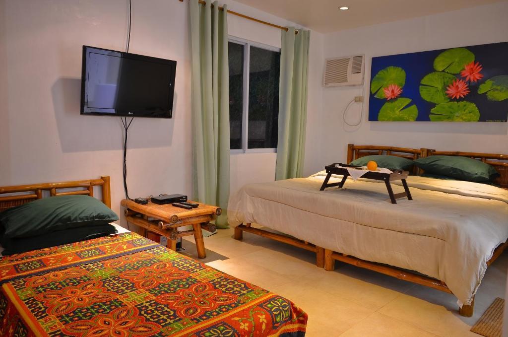 Punta Bulata White Beach Resort & Spa Cauayan  الغرفة الصورة
